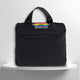 A black cotton travel vanity bag with many Greek travel size personal hygiene products inside for the LGBTQ+ community 