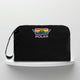 A black cotton travel vanity bag with many Greek travel size personal hygiene products inside 