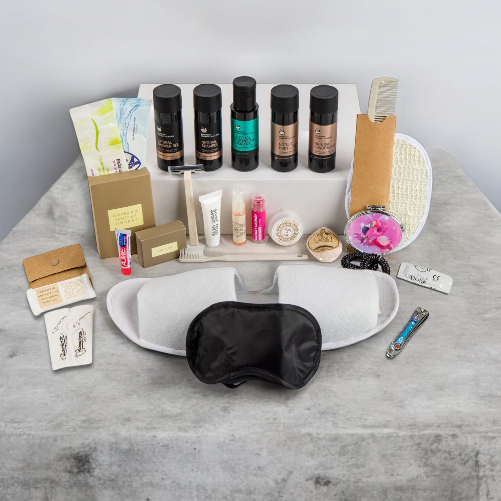 Organic Greek travel size shampoo , conditioner, shower gel, body lotion and many other non gender specific toiletries that are inside the POLKA LGBTQ+ travel vanity bag.