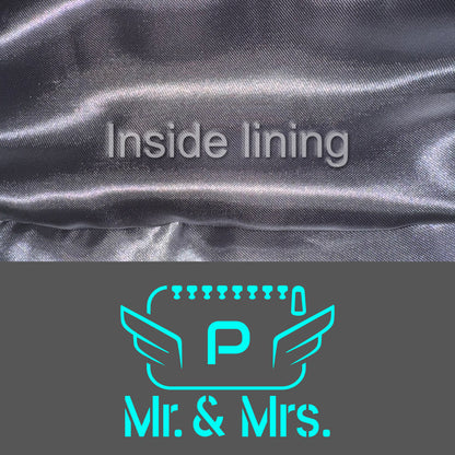 Detail of the grey color of the fabric and mint logo with the inside lining of the luxury POLKA vanity bag for couples