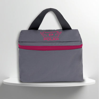 A grey cotton travel vanity bag with many Greek travel size personal hygiene products inside for the LGBTQ+ community