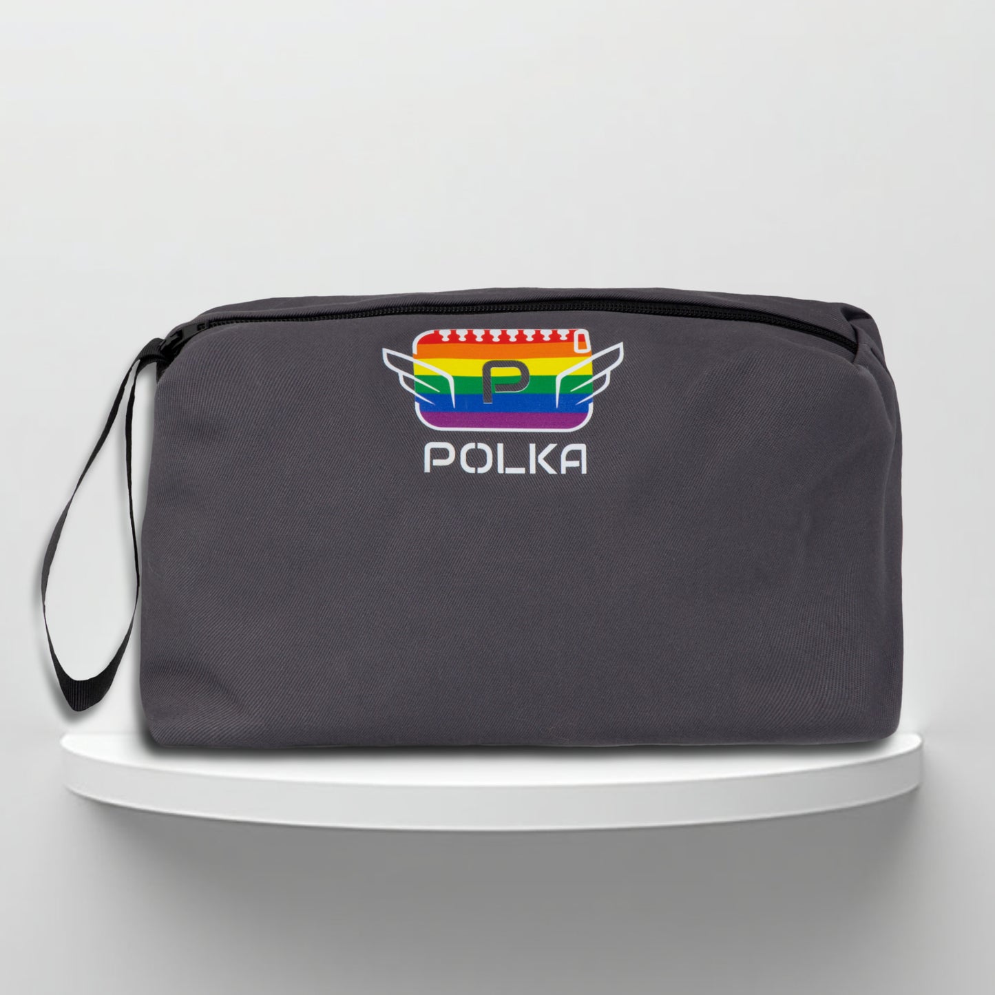 A grey cotton travel vanity bag with many Greek travel size personal hygiene products inside lgbtq+