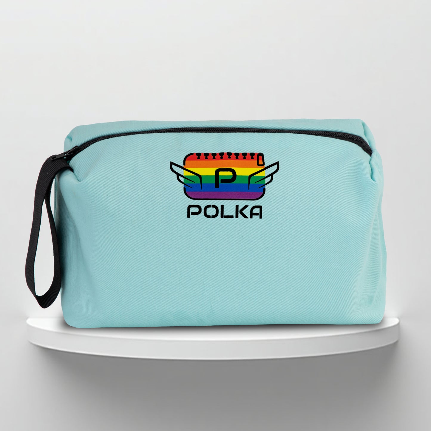 A mint cotton travel vanity bag with many Greek travel size personal hygiene products inside lgbtq+